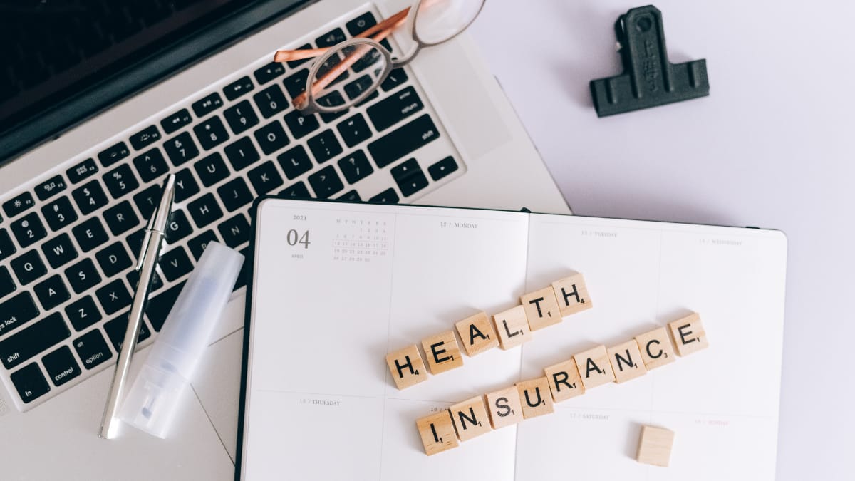 Can a visitor get health insurance in the US?