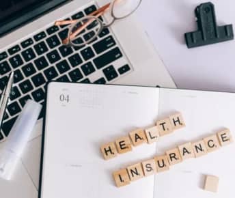 Can a visitor get health insurance in the US?