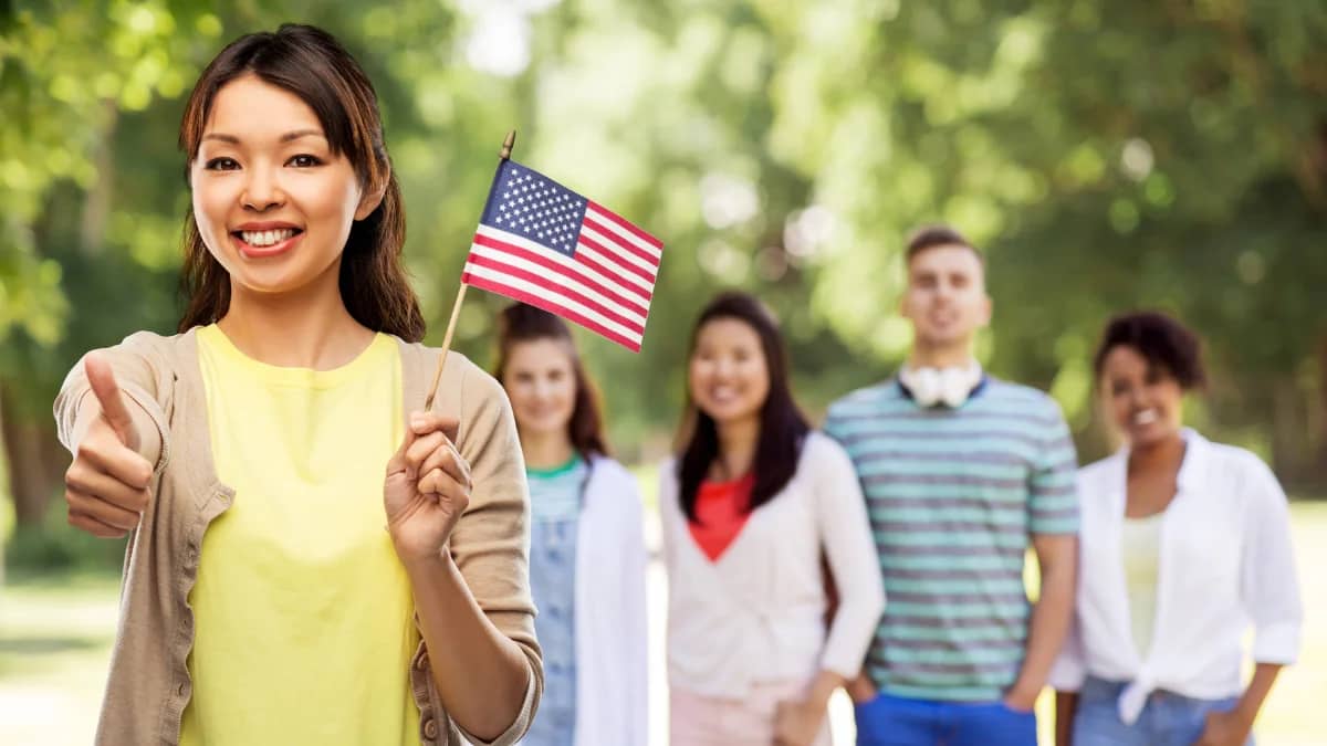 Are the immunizations and medical exams needed for green cards covered by visitor insurance?