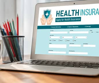 Can a visitor get health insurance in the US?