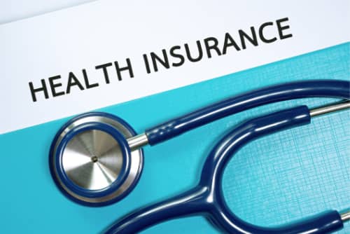 Is health insurance mandatory for visitors to the US?